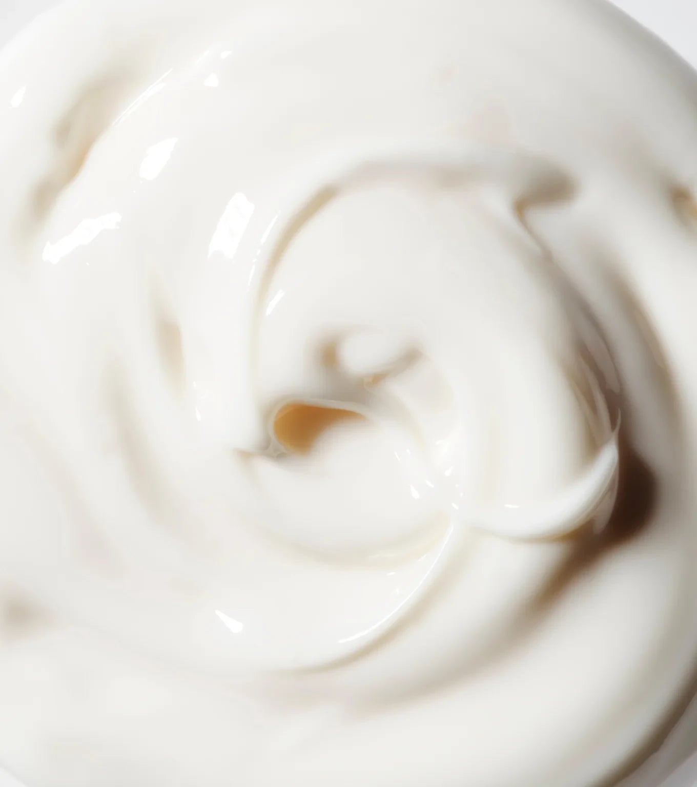 Close-up of a smooth swirl of eye cream