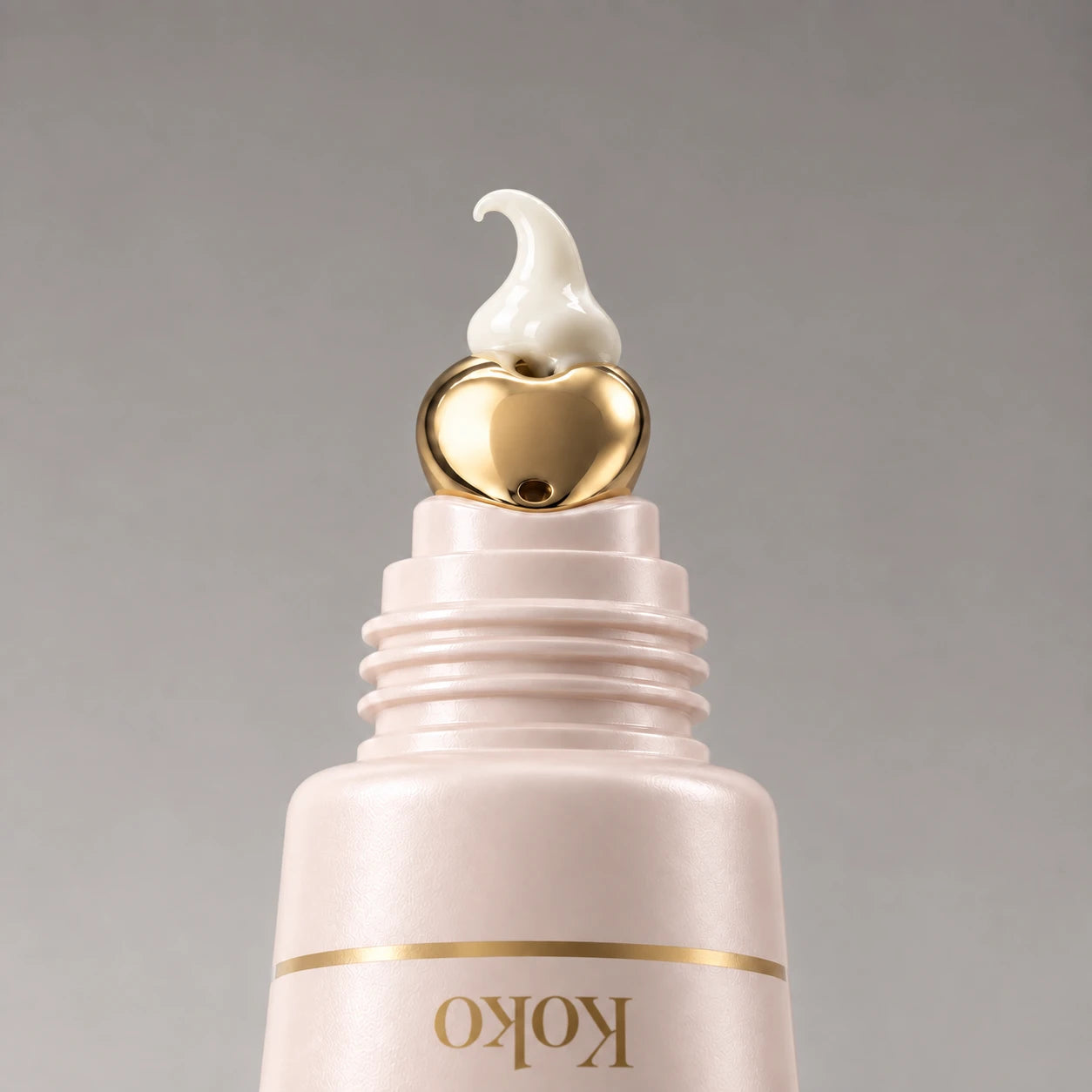 Close-up of the Koko primer applicator with a small amount of product