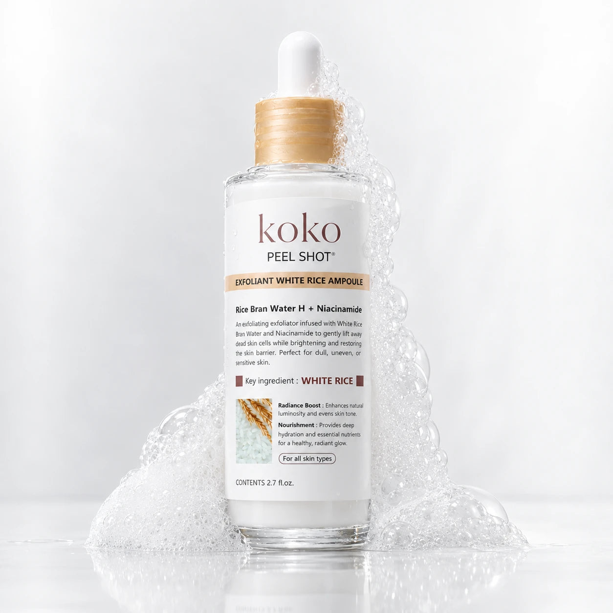 Koko White Rice Ampoule surrounded by bubbles